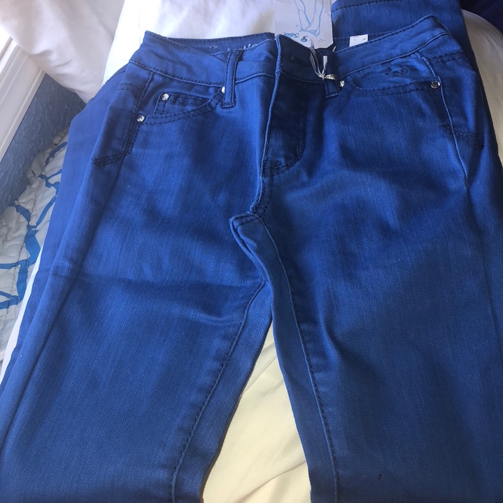 Royal blue skinny jeans by Justice 12 slim